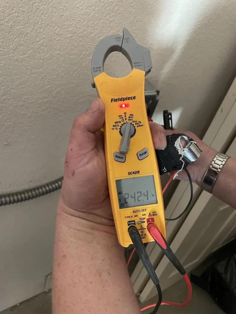 Voltage testing with clamp meter during Hot Tub / Pool Electrical Wiring in Bellbrook